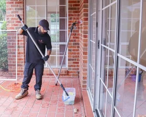 Solar panels and interior glass being cleaned